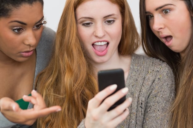 A close-up shot of a smartphone displaying a trending hashtag related to a celebrity controversy, with blurred faces reacting in shock in the background.