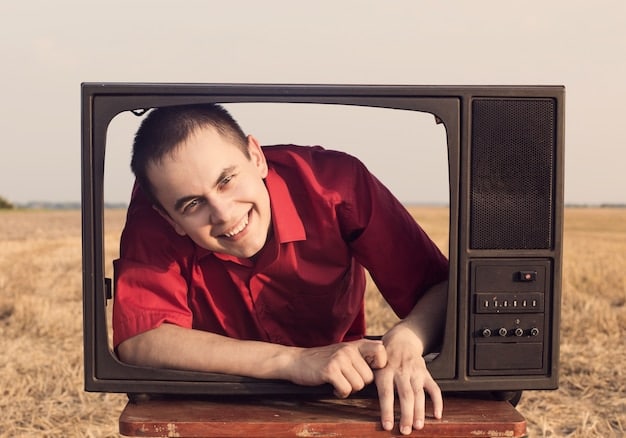 A split-screen image showing a traditional television set playing an award show on one side, contrasted with a person streaming content on a tablet on the other. The contrast highlights the shift in media consumption.