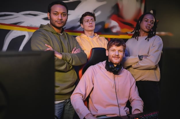A group of college students excitedly playing esports in a university esports arena, with banners and logos of the university visible in the background.