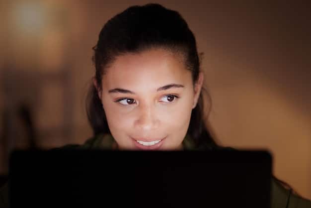 A close-up shot of a young person's face, illuminated by a monitor displaying a video game. Their eyes are wide and unfocused, and their expression conveys a sense of being lost in the game. The background is dark and out of focus.