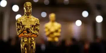 Golden Oscar statue on a red carpet, symbolizing cinematic achievement